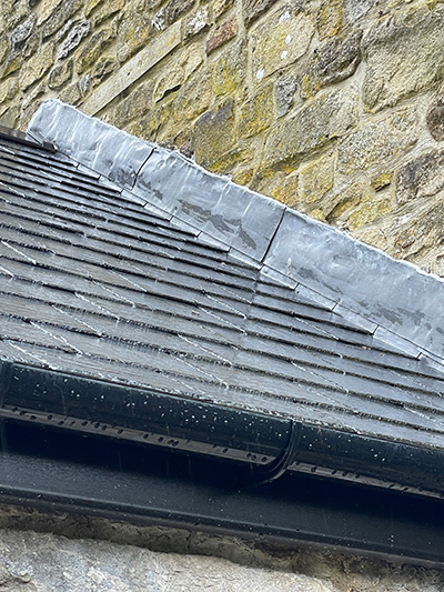 Lead flashing on a roof join